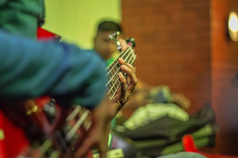 A guitarist performing live at Skkky, Siliguri