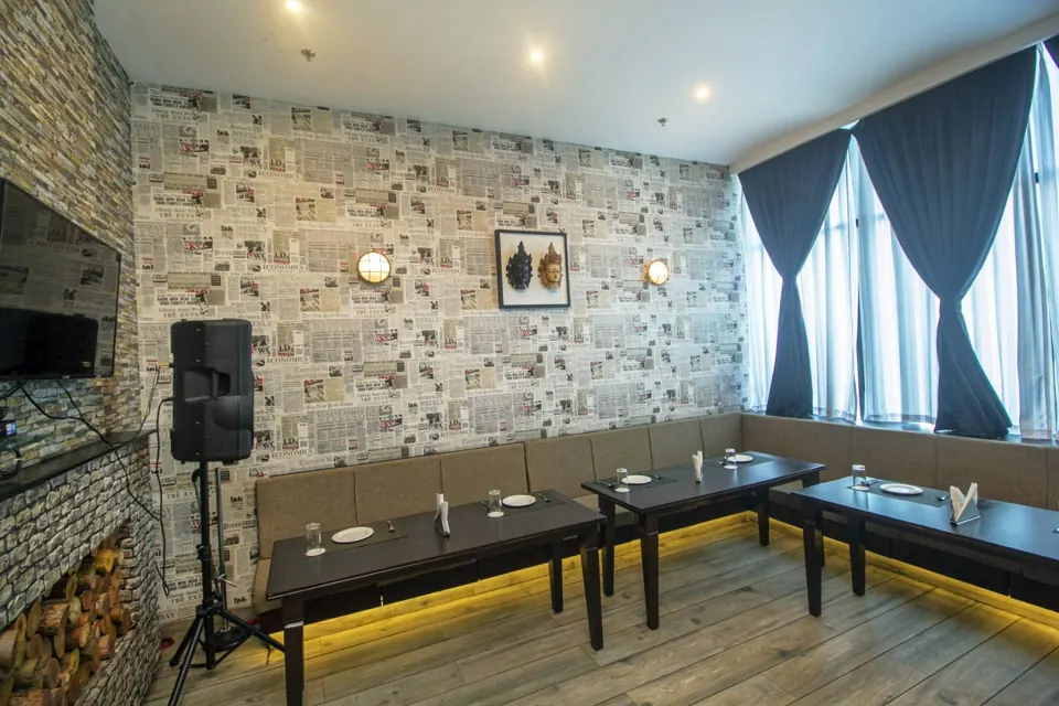 Private party room at Skkky, Siliguri, with long tables laid for a celebration